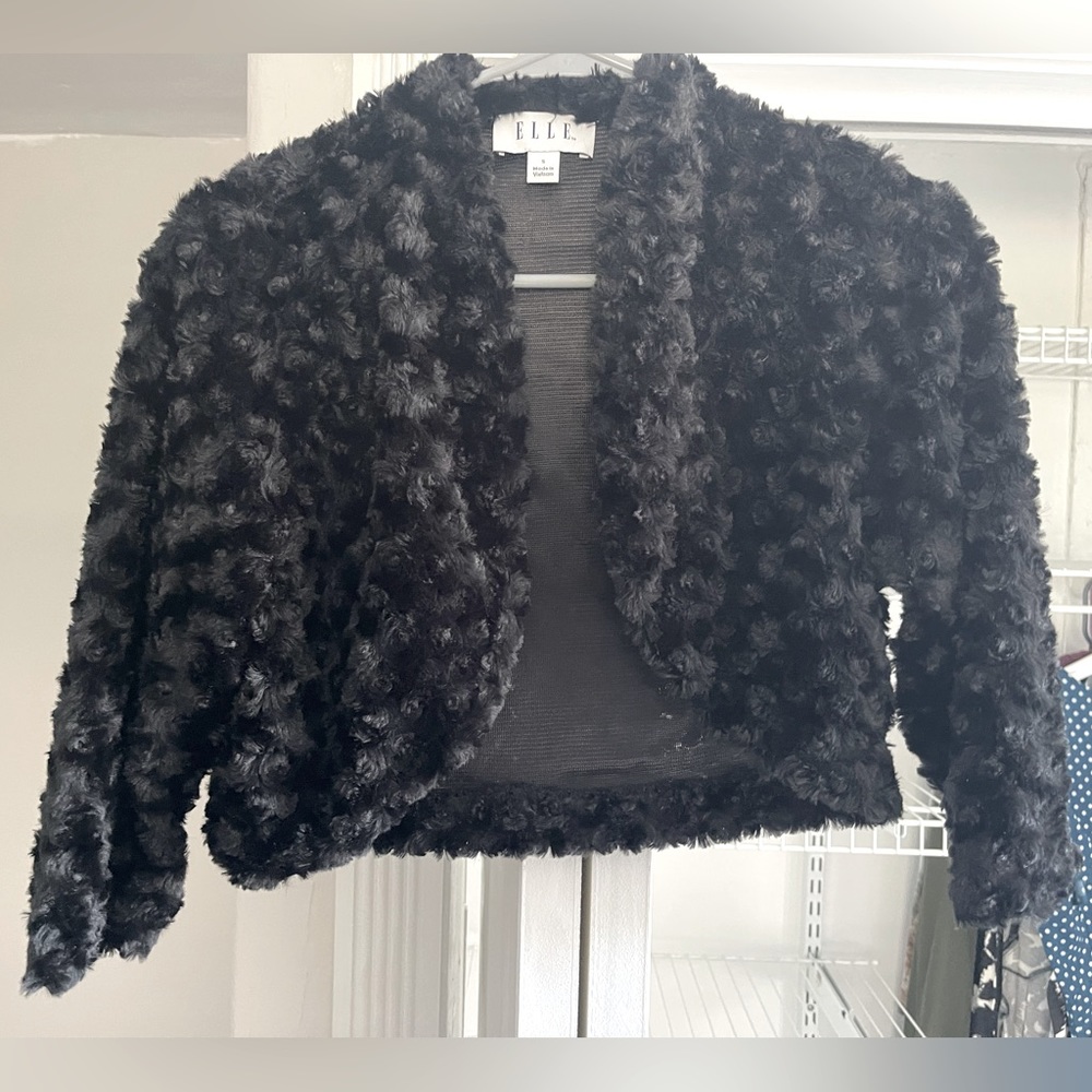 Soft black shrug, great for night or day wear. Elle small black 3/4 jacket